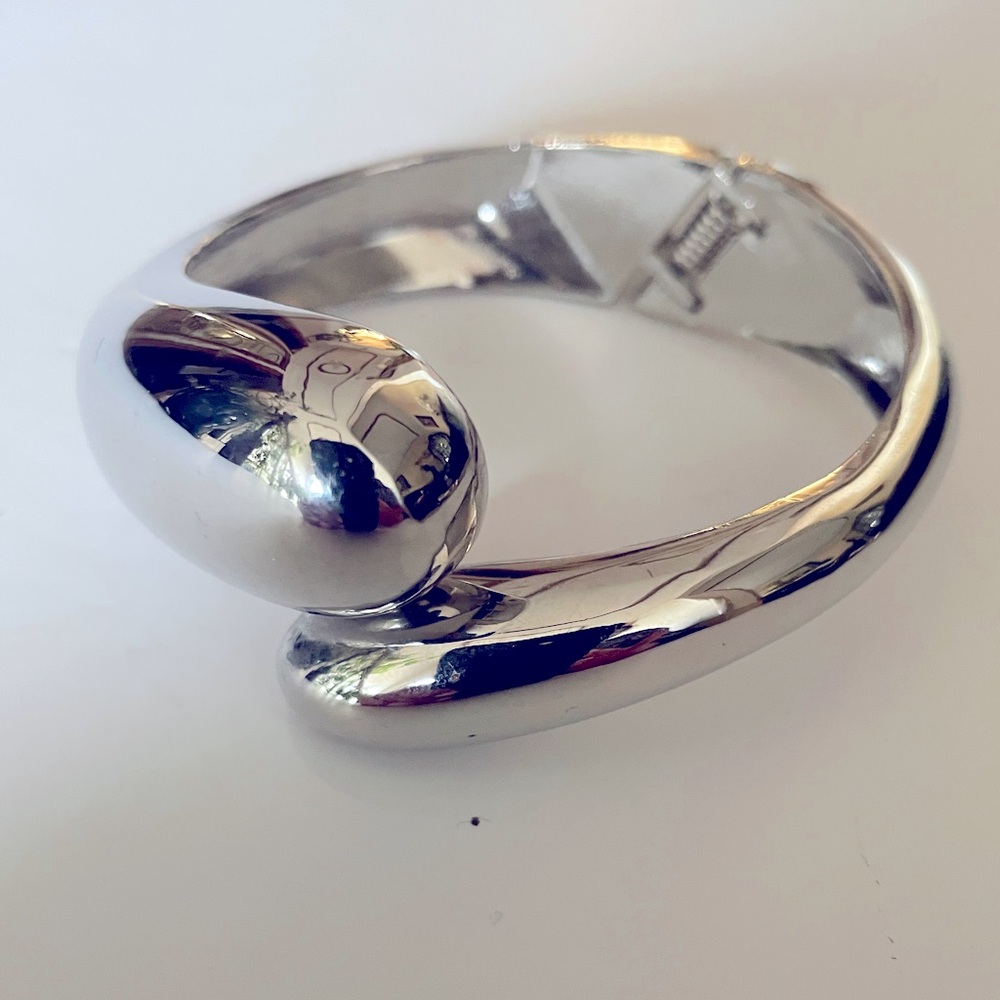 - NWOT Silver Plated Cuff Bracelet.